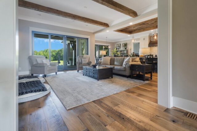 southend-reclaimed-original-face-skip-planed-reclaimed-oak-solid-plank-flooring-hand-hewn-box-beams-2