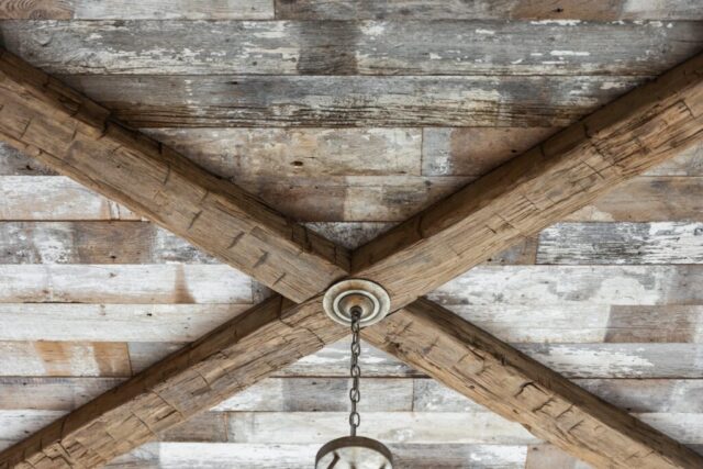 Faded White Barnwood Ceiling Planking and Hand Hewn Box Beams