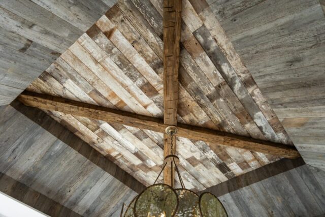 Weathered Grey and Faded White Barnsiding Ceiling Planking and Hand Hewn Box Beams