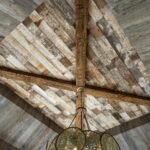Weathered Grey and Faded White Barnsiding Ceiling Planking and Hand Hewn Box Beams