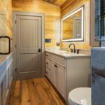 Reclaimed Wormy Chestnut Wall Paneling and Original Face Reclaimed Skip Planed Oak Flooring