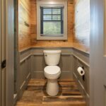 Reclaimed Wormy Chestnut Wall Paneling and Original Face Reclaimed Skip Planed Oak Flooring