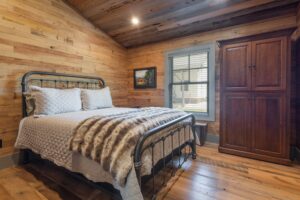 River Reclaimed Sinker Pecky Cypress Ceiling Planking, Reclaimed Wormy Chestnut Wall Paneling and Original Face Reclaimed Skip Planed Oak Flooring