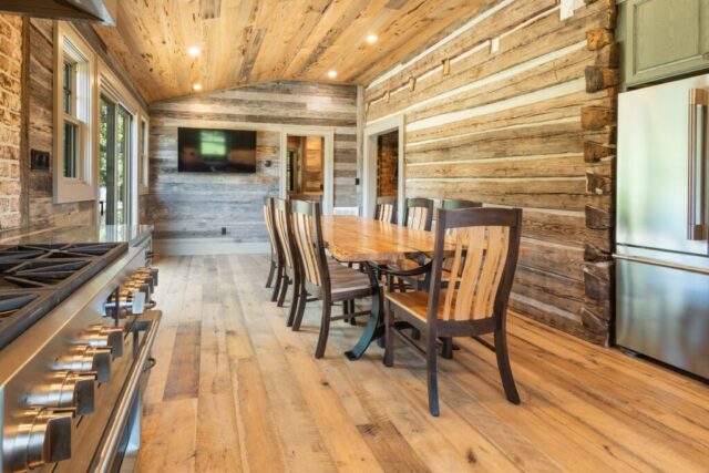 River Reclaimed Sinker Pecky Cypress Ceiling Planking and Original Face Reclaimed Skip Planed Oak Flooring