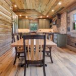 River Reclaimed Sinker Pecky Cypress Ceiling Planking and Original Face Reclaimed Skip Planed Oak Flooring