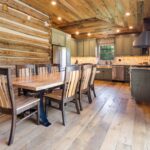 River Reclaimed Sinker Pecky Cypress Ceiling Planking and Original Face Reclaimed Skip Planed Oak Flooring