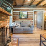 River Reclaimed Sinker Pecky Cypress Ceiling Planking and Original Face Reclaimed Skip Planed Oak Flooring
