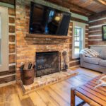 River Reclaimed Sinker Pecky Cypress Ceiling Planking and Original Face Reclaimed Skip Planed Oak Flooring