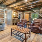 River Reclaimed Sinker Pecky Cypress Ceiling Planking and Original Face Reclaimed Skip Planed Oak Flooring