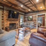 River Reclaimed Sinker Pecky Cypress Ceiling Planking and Original Face Reclaimed Skip Planed Oak Flooring