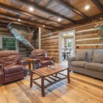 River Reclaimed Sinker Pecky Cypress Ceiling Planking and Original Face Reclaimed Skip Planed Oak Flooring