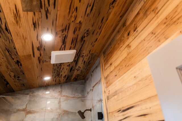 River Reclaimed Sinker Pecky Cypress Ceiling Planking and Reclaimed Wormy Chestnut Wall Paneling