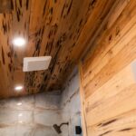 River Reclaimed Sinker Pecky Cypress Ceiling Planking and Reclaimed Wormy Chestnut Wall Paneling